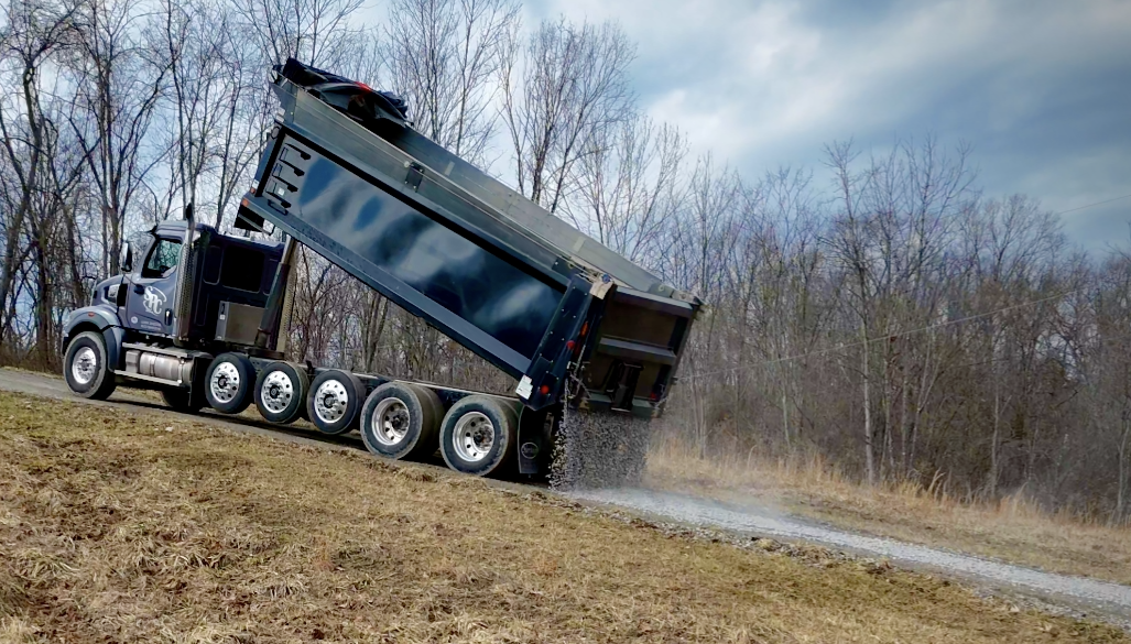 Truck Spreading Stone